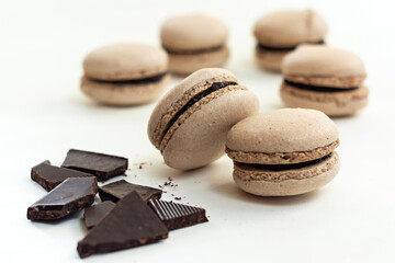 Home made french macarons with chocolate ganache filling. Relaxing time at home. Home sweet baking.