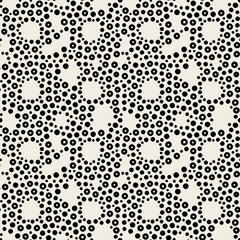 Vector seamless pattern. Abstract spotty texture. Natural monochrome design. Creative background with tiny blots. Decorative organic swatch.