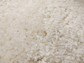 A fluffy beautiful carpet. Copy space. Flat lay, top view.