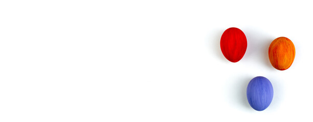 Happy Easter card. Colorful shiny easter eggs on isolated white background. Copy space for text. Banner