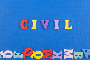 CIVIL word on blue background composed from colorful abc alphabet block wooden letters, copy space for ad text. Learning english concept.