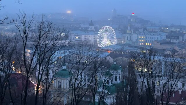 Kyiv city capital of Ukraine, Podol district in the foggy evening.
