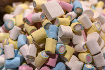 Multi-colored marshmallows in the store. Background or texture of colorful pastel marshmallows.