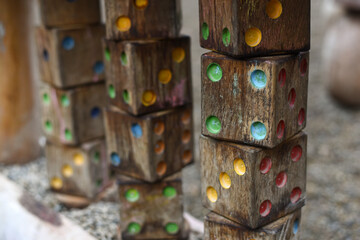 wooden dice for teaching children on the playground.