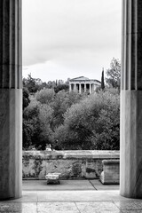 View of Temple of Apollo Patroos through the columns of Stoa of Attalos (Stoa of Attalus) in...