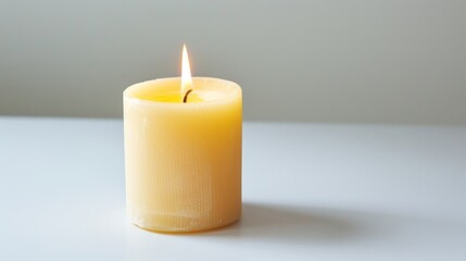 Obraz na płótnie Canvas Macro View of Aromatic Candle Against Minimalist White Background.