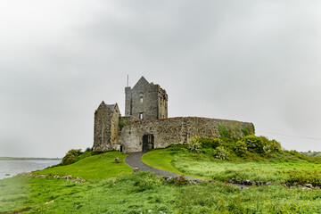 Dunguaire Castle, a 16th-century tower house on the southeastern shore of Galway Bay in County Galway, Ireland, near Kinvara.