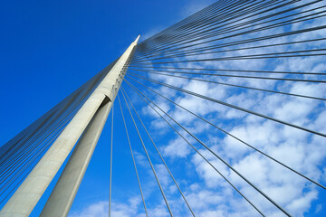 Cable stayed bridge in Belgrade, Serbia. Part of the Ada bridge beautiful sky with cloud...