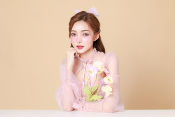 Young cute Asian woman in a pink elegant dress, Korean style makeup, moisturized, smooth, perfect...