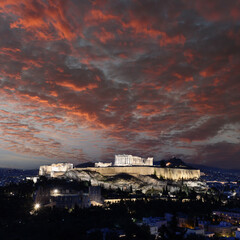 Panorama of Acropolis hill at night, Athens, Greece. Famous old Acropolis is a top landmark of Athens. Ancient Greek ruins in the Athens center at dusk 