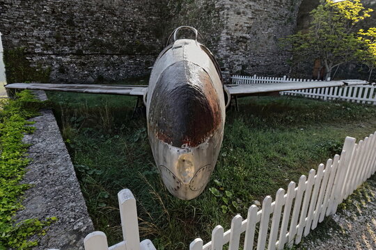 Old U.S.military airplane rusting outdoors while on display as part of the arms housed in the local fortress. Gjirokaster-Albania-203+