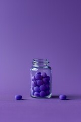 pills in glass bottle