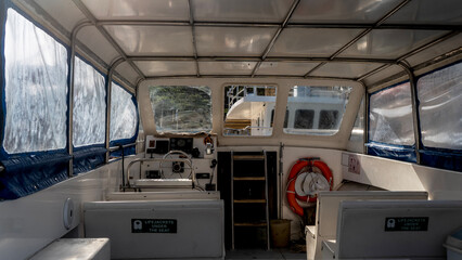 view from the lounge of a small motor boat for sightseeing tours