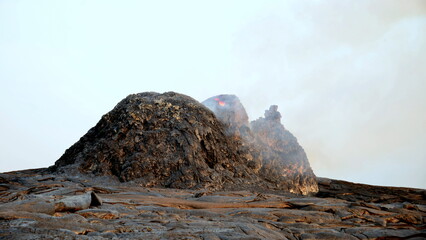 Erta Ale is a chain of volcanoes located in the Afar Triangle, Ethiopia. Here the Earth is...