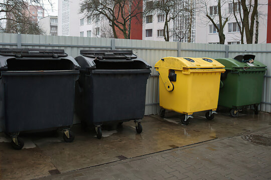 plastic dumpsters for separate garbage collection on the street. Plastic factory