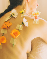 woman with flowers on her back