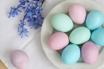 Easter concept, painted eggs in pastel colors. flat lay, top view.