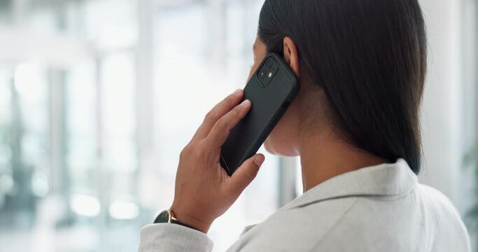 Startup, deal or back of businesswoman on a phone call talking, networking or speaking of ideas in office. Listening, mobile communication or entrepreneur in conversation for a negotiation offer