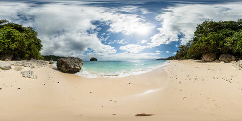 White sand beach with beautiful waves. Ilig - Iligan Beach in Boracay. Malay, Aklan. Philippines....