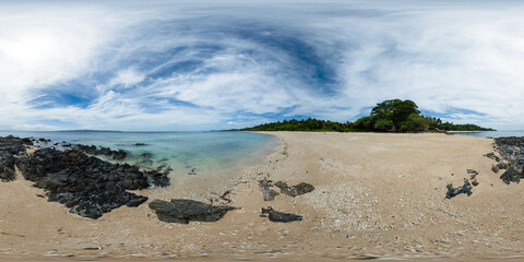 Beach with ocean waves over the sands and rocks. Santa Fe, Romblon. Philippines. VR 360.