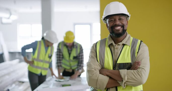 Face, construction or happy black man with arms crossed, confidence or smile in architecture meeting. Engineering team, development planning or portrait of builder, maintenance worker or contractor