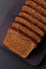 Delicious brown bread with seeds and grains cut into slices