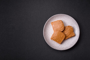 Delicious hearty sandwich with toast bread and peanut butter