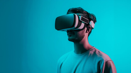 Young Man with VR Headset on Blue Background - Concept of Virtual Reality Experience with Simple Desing and Copy Space