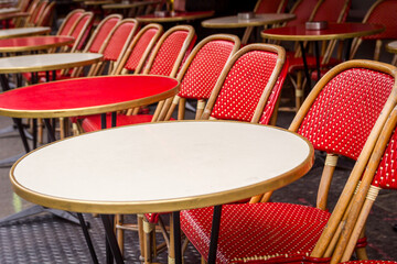Typical table and chairs in the streets of Paris, France - 738938464