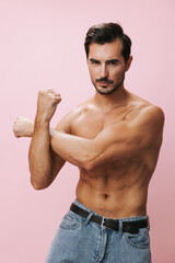 Fototapeta premium Man background belt naked sport lifestyle body fitness muscular torso pink muscle sexy