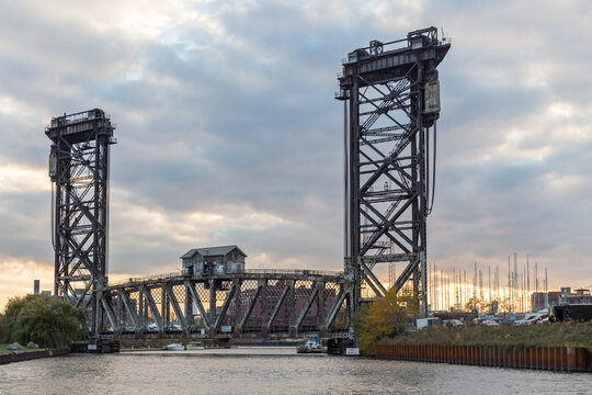 Canal Street Railroad Bridge a vertical lift bridge as seen From Ping Tom Park in Chinatown, Chicago under a clear blue sky and above the Chicago River, Chicago, IL