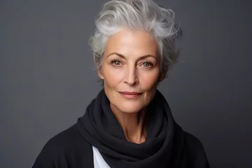 Deurstickers Confident Senior Woman with Stylish Grey Hair © Marharyta
