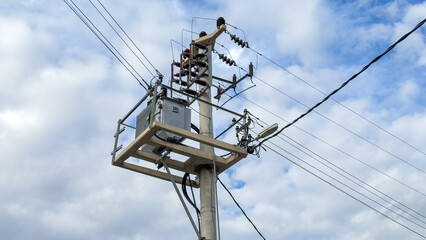 Close shot of a high power electrical system on top of a utility pole