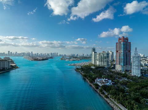 Aerial view of turquoise water of Government cut, busy waterway connecting the ocean to Miami cruise port, Fisher Island, South Beach 