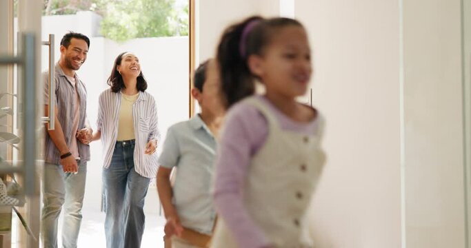 Parents, new home and children running, walking and excited for moving in, mortgage and real estate at entrance. Interracial family, mom and dad with kids in front door for dream house or property
