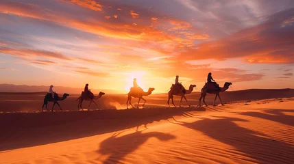 Foto op Plexiglas An exotic adventure unfolds as tourists ride camels across the sand dunes of the desert at sunrise, creating a mesmerizing scene in Erg Chebbi, Morocco, Africa © Marry