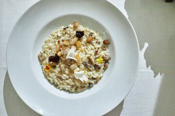 Risotto in a white dish.