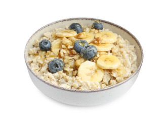 Tasty oatmeal with banana, blueberries, milk and walnuts in bowl isolated on white