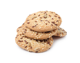 Round cereal crackers with flax, sunflower and sesame seeds isolated on white