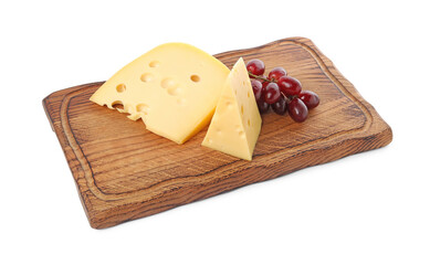 Pieces of delicious cheese and grapes isolated on white