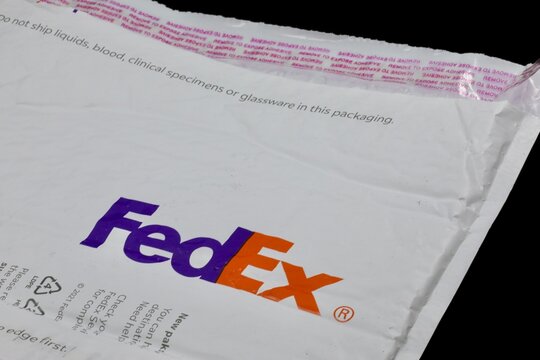 FedEx packaging envelope. Federal Express in a delivery company. February 14