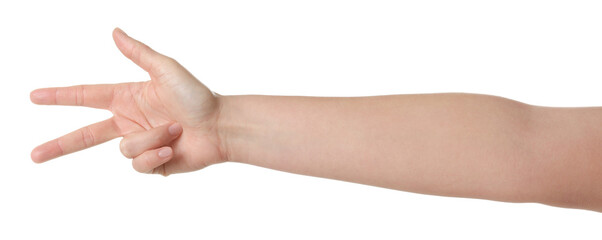 Playing rock, paper and scissors. Woman making scissors with her fingers on white background,...
