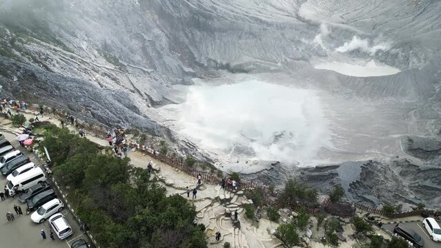 Tangkuban Parahu Mountain - The Overturned Boat with Astonishing View, an active volcano, in Lembang, Bandung. Vibrant Daytime Gathering in Nature's Majestic Mountain Landscape.