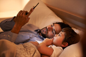 Home, father and son with tablet, night and family with storytelling and connection with social...