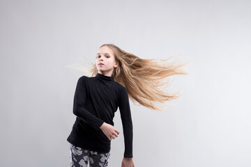 Dynamic hair motion exudes girl's confident style