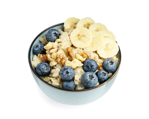 Tasty oatmeal with banana, blueberries and walnuts in bowl isolated on white