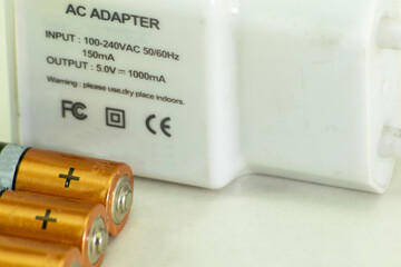Voltage adapter next to batteries