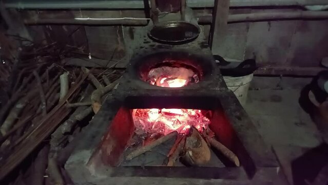 A traditional Vietnamese fire stove is burning in Vinh Long province, Vietnam.