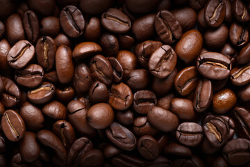 Obraz premium Processed collage of dark brown coffee beans texture. Background for banner, backdrop or texture