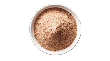 A bowl filled with flour sits on a table, with a pile of flour next to it png